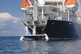 Sailing yacht RUNNING ON WAVES -  Stern
